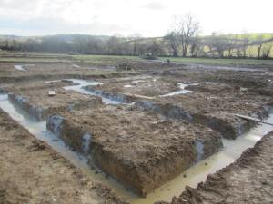 Trenches after being filled with concrete